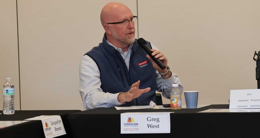 Greg West speaking to the issues at a metting.